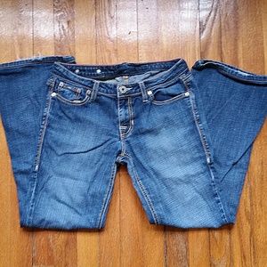 Low-rise, boot-cut ankle jeans Times Square